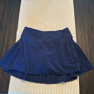 Athleta girl navy pleated tennis skort